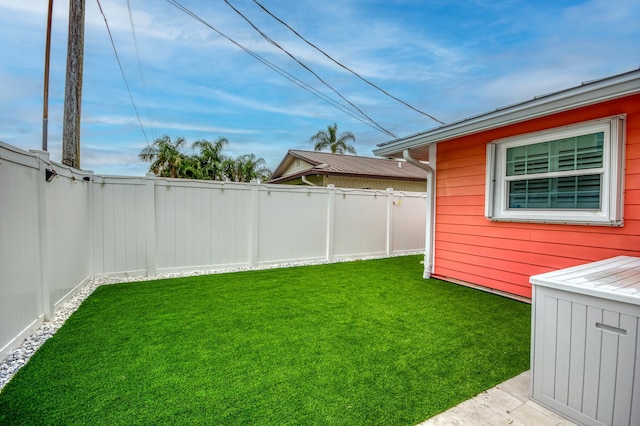 view of yard featuring a fenced backyard