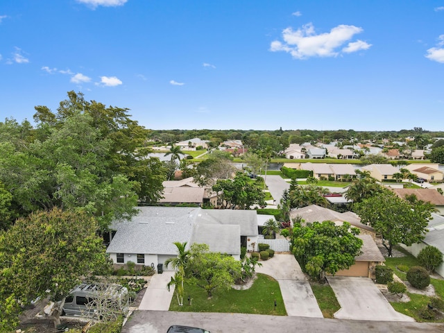 birds eye view of property with a residential view