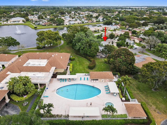 aerial view featuring a water view and a residential view