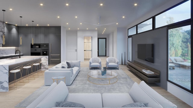 living room featuring expansive windows, light wood-type flooring, and recessed lighting