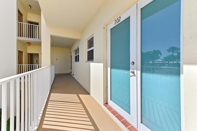 balcony featuring french doors