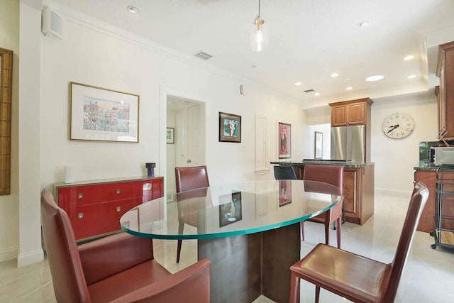 dining room featuring light tile patterned floors, recessed lighting, baseboards, and ornamental molding