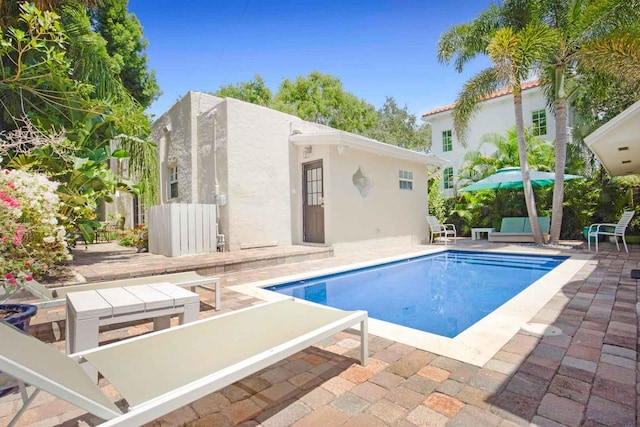 pool with a patio