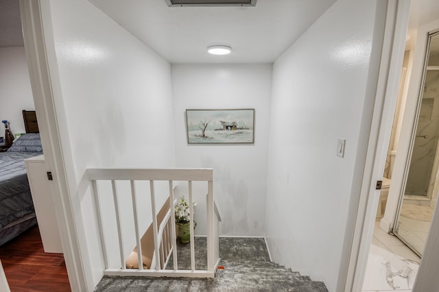1700 Embassy Dr Unit 510, West Palm Beach, FL 33401 - staircase featuring wood finished floors
