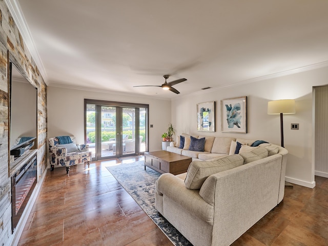 living room with french doors, ornamental molding, and baseboards