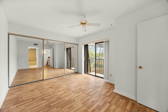 unfurnished bedroom with ceiling fan, access to outside, baseboards, and light wood-style flooring