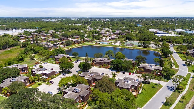 bird's eye view featuring a water view and a residential view