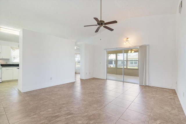 6625 Alheli Ct, Fort Pierce, FL 34951 - empty room featuring visible vents, high vaulted ceiling, a ceiling fan, light tile patterned floors, and baseboards