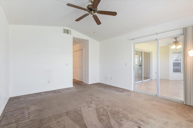 6625 Alheli Ct, Fort Pierce, FL 34951 - carpeted empty room featuring visible vents, baseboards, lofted ceiling, and a ceiling fan