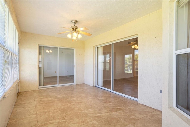 6625 Alheli Ct, Fort Pierce, FL 34951 - unfurnished sunroom with a ceiling fan