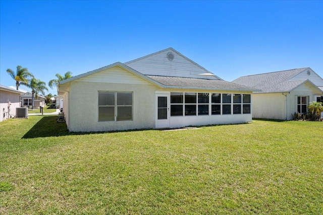 6625 Alheli Ct, Fort Pierce, FL 34951 - back of house featuring central air condition unit and a lawn