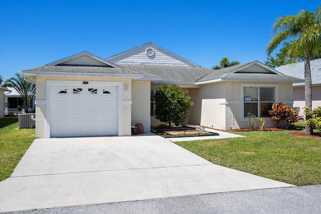 6625 Alheli Ct, Fort Pierce, FL 34951 - single story home featuring stucco siding, a front lawn, roof with shingles, concrete driveway, and a garage
