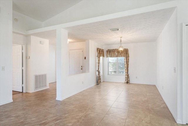 6625 Alheli Ct, Fort Pierce, FL 34951 - unfurnished room featuring a chandelier, visible vents, a textured ceiling, and baseboards