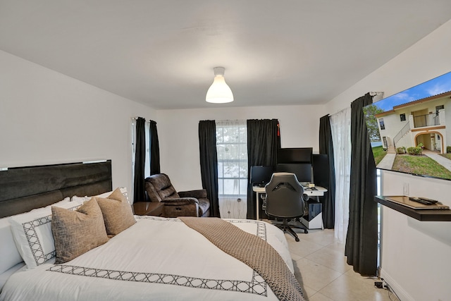 bedroom featuring light tile patterned floors