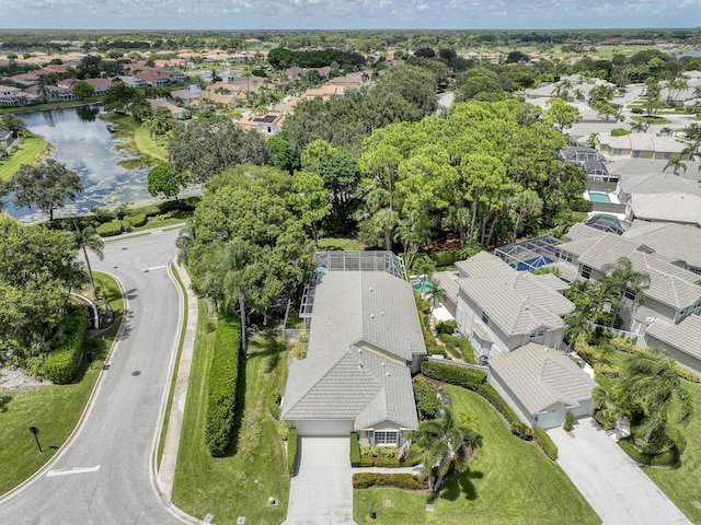 aerial view featuring a water view and a residential view