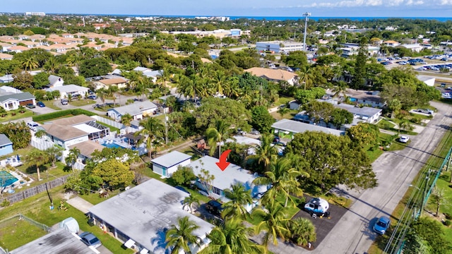 birds eye view of property with a residential view