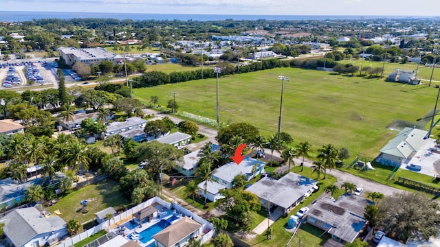 birds eye view of property with a residential view