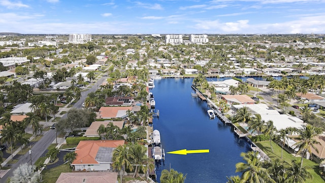 birds eye view of property featuring a residential view and a water view