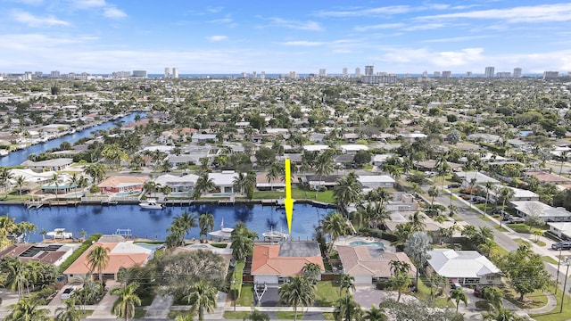 aerial view with a water view and a view of city