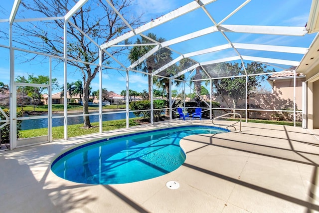 pool with a lanai and a patio