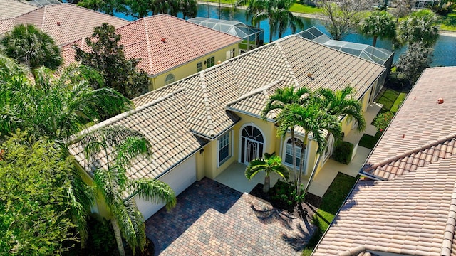 birds eye view of property featuring a water view