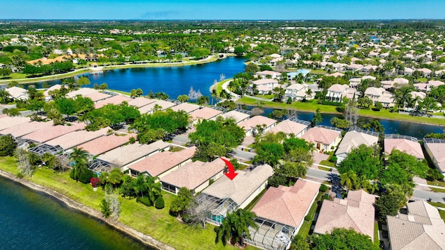 aerial view featuring a water view and a residential view