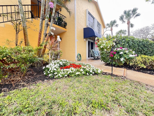 exterior space featuring stucco siding