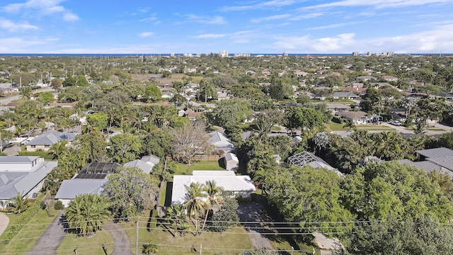 birds eye view of property with a residential view