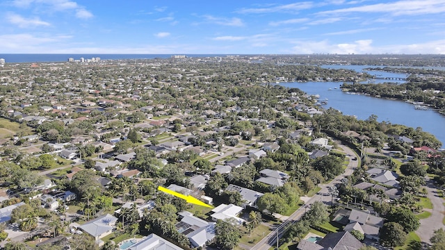 aerial view featuring a residential view and a water view