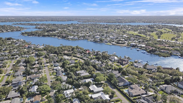 birds eye view of property featuring a water view and a residential view