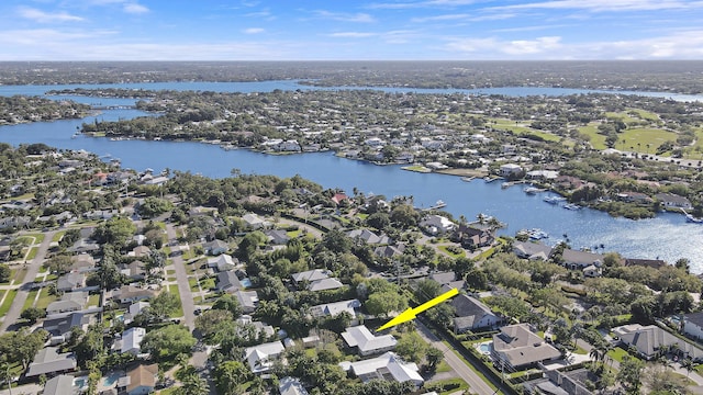 aerial view featuring a water view and a residential view