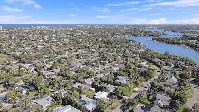 birds eye view of property featuring a water view and a residential view