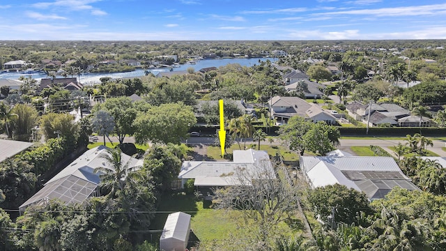 bird's eye view with a residential view and a water view