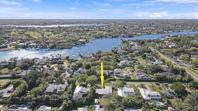 bird's eye view with a water view and a residential view