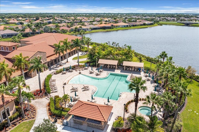 aerial view featuring a water view and a residential view