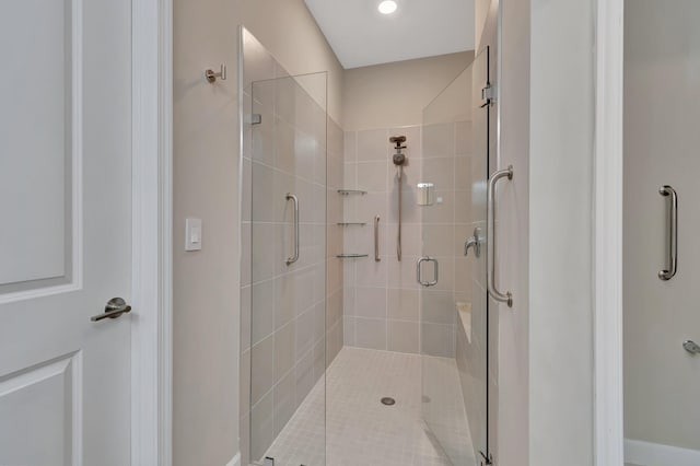 bathroom featuring a shower stall