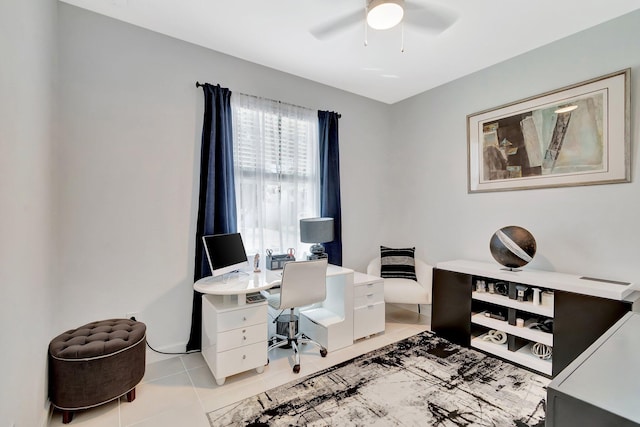 office area featuring light tile patterned floors and ceiling fan