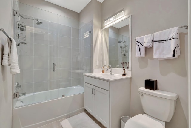 full bath with vanity,  shower combination, and toilet