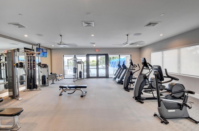 workout area featuring visible vents, recessed lighting, and french doors