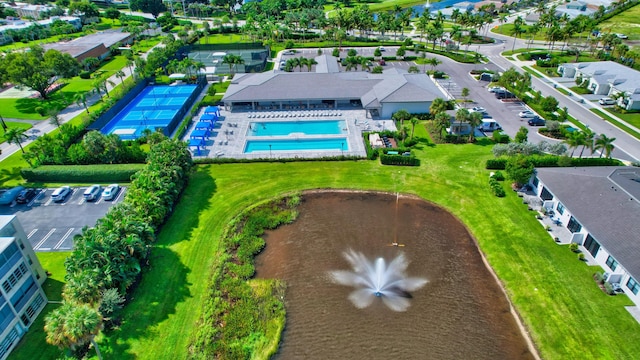 birds eye view of property with a residential view