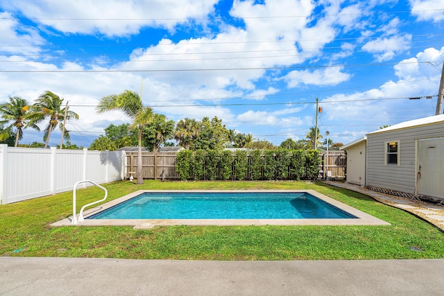 view of pool featuring a fenced backyard, a fenced in pool, and a lawn