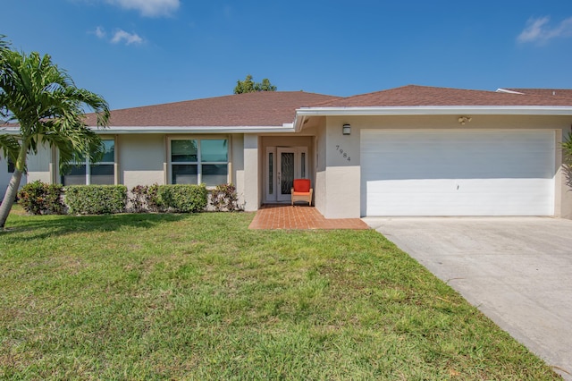 single story home with a front lawn, concrete driveway, roof with shingles, stucco siding, and an attached garage