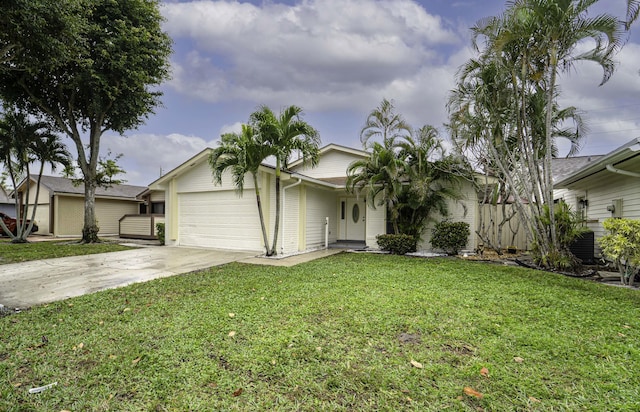 view of front of home with an attached garage, a front lawn, concrete driveway, and brick siding