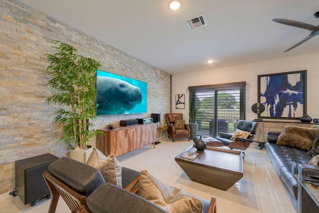 living room featuring light tile patterned floors, visible vents, a ceiling fan, and recessed lighting