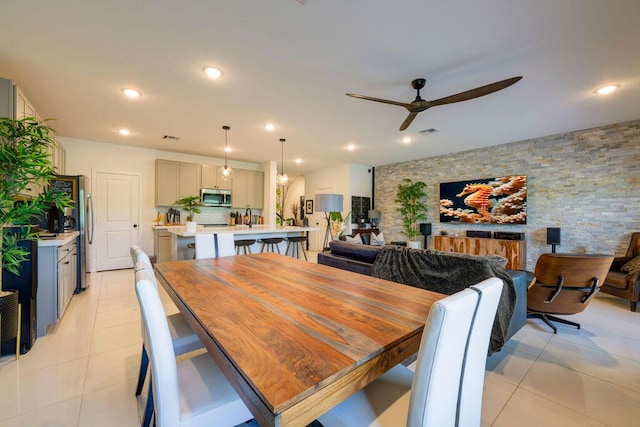 dining space featuring light tile patterned floors, visible vents, a ceiling fan, and recessed lighting