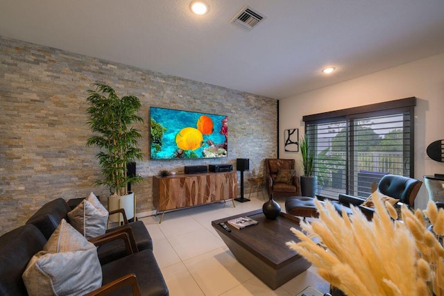 living area with visible vents and recessed lighting