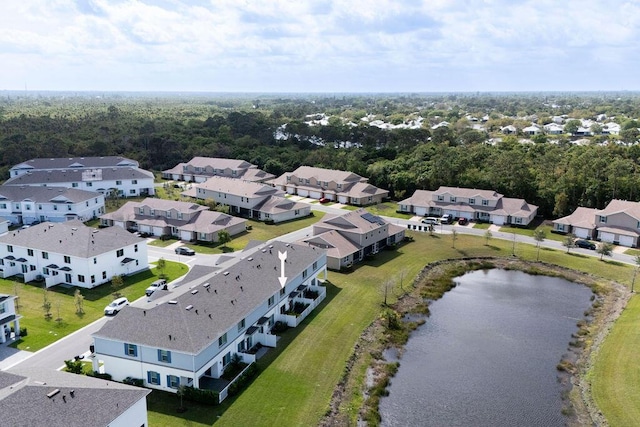 bird's eye view with a water view and a residential view