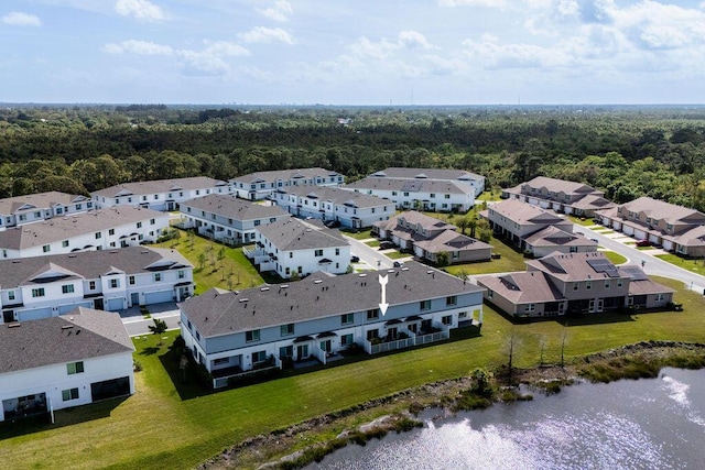 aerial view with a water view and a residential view