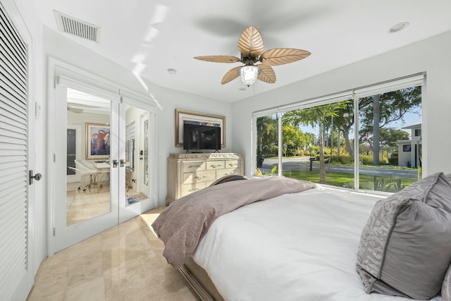 bedroom featuring access to exterior, visible vents, a ceiling fan, and french doors