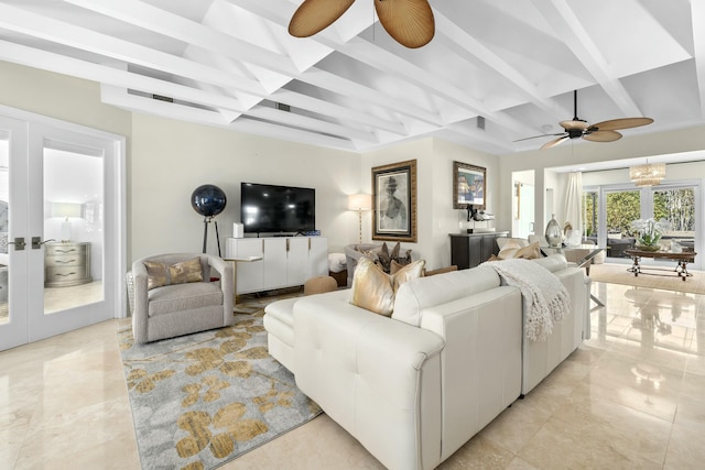 living area featuring ceiling fan with notable chandelier, french doors, beamed ceiling, and coffered ceiling